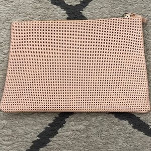 Clare V perforated pink clutch